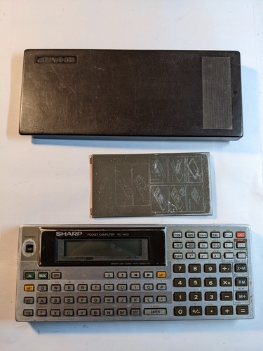 Sharp 1450 calculatrice - sharp,