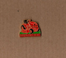 pin's tondeuse auto portée