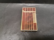 Briquet Renaissance MXM Métal doré laqué Bel état Dim 3,5 x 0,9 cms  haut 6,3 cm