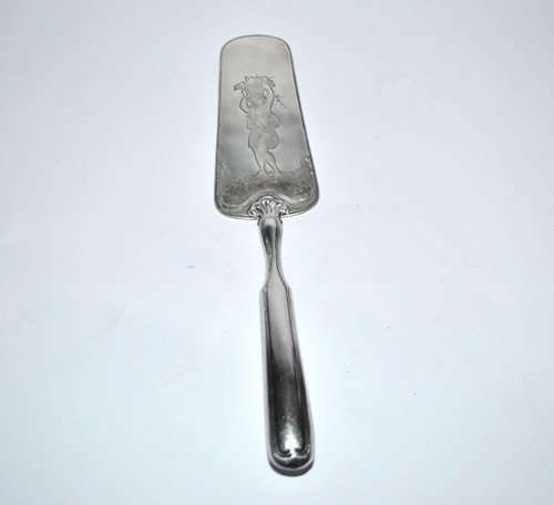 Pelle tarte décor gravé - pelle, à