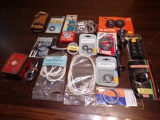 Lot objets vélos vintage ( cables , cages à billes , ruban , vis ... )