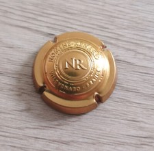 Capsule de Champagne Nominé-Renard à Villevenard dorée et embossée