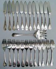 12 COUVERTS À POISSON MÉTAL