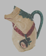pichet en faïence des moulins d'Orchies  thèmes le cochon . XX siècle .