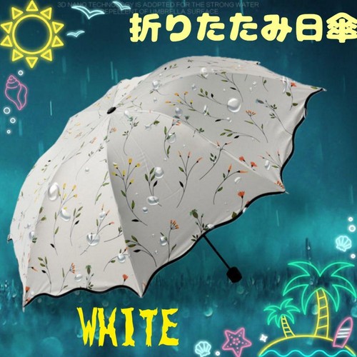 Unused floral folding parasol - unused,