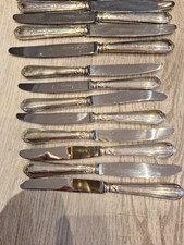 6 couteaux à viande + 8