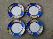 Lot 4 assiettes porcelaine