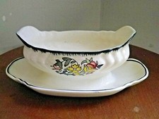 Ancienne saucière à soucoupe