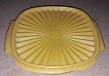 Tupperware boite soleil jaune