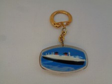 ANCIEN PORTE CLE PLASTIQUE  PAQUEBOT FRANCE LUBRIFIE PAR MOBIL