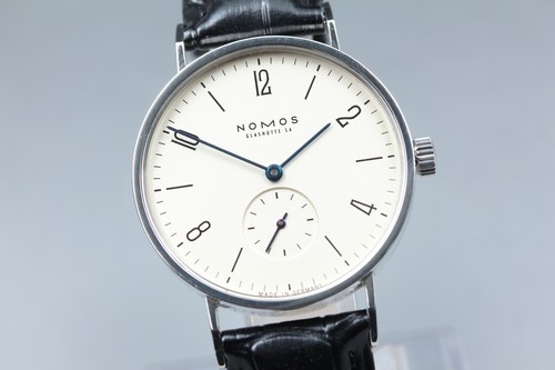 Avec papier montre nomos - avec, ]
