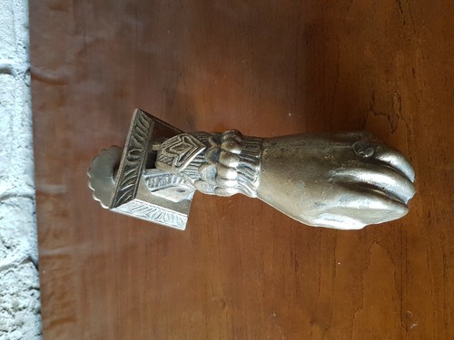 Heurtoir bronze forme de - en,