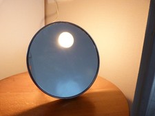 Ancien miroir rond éclairant