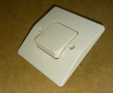 Poussoir socle série Neptune blanc cassé-beige foncé  / Legrand matériel vintage