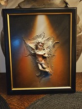  CUADRO EN RELIEVE. RESINA.belle statuette de petit ange dans le tableau
