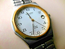 GUY LUSSAC MONTRE VINTAGE FRANÇAISE MIXTE A DATE ET MOUVEMENT SUISSE D'EPOQUE