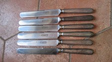 6 couteaux métal argenté