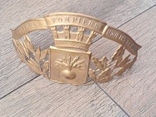 Une plaque de casque de Pompiers " Moulins la Marche / Orne 61".