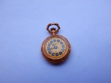mini Montre PENDENTIF UNIC