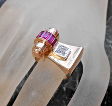 Bague Tank or jaune  18K  sertie rubis et saphir blanc  poincon  aigle  T 52