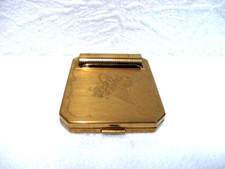 Ancien poudrier Corona en