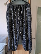 Pantalon neuf taille 50-52 noir à motif