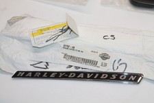 EMBLEME COUVERCLE BOITE A AIR GAUCHE pr HARLEY DAVIDSON .ref 62792-06 *ORIGINAL