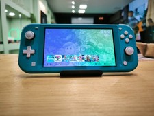 ?switch lite pucé 256go + jeux ?