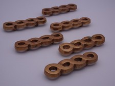 SIX PORTE COUTEAUX en BRONZE vers 196070. Boîte d'origine. Paris.