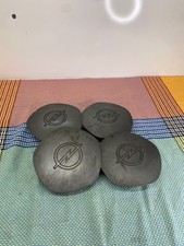 Ensemble de 4 enjoliveur Opel Corsa dans leurs jus. A771