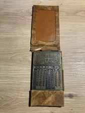 Ancienne machine à calculer REBO UNIS FRANCE avec étui et stylet d'origine