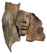 Sculpture visage en terre cuite 24 x 20 cm env Poids 436 grs Décoration murale