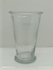 Verre doseur ancien en verre moulé " MOUGIN "
