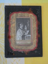 image pieuse  st louis gonzague encadré d'une bordure dorée et mise sous verre