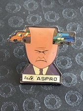 Pin’s Publicité ASPRO Maux De Tête dessin par SAVIGNAC Signé Parkson