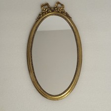 Miroir doré noeud ovale