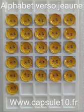 NEWS CAPSULE DE CHAMPAGNE alphabet verso jeaune  rare générique 