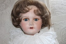 Grande poupée tête en carton