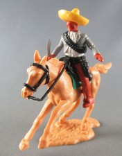 Timpo - Mexicains - Cavalier ceinture moulée pose du couteau veste grises jambes