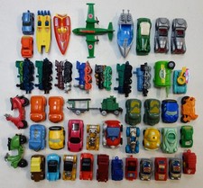Lot miniatures (train voiture canot avion scooter) KINDER surprises (1990-2000)