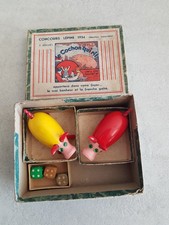 Ancien jeu de "cochon qui rit"en bois pour deux joueurs