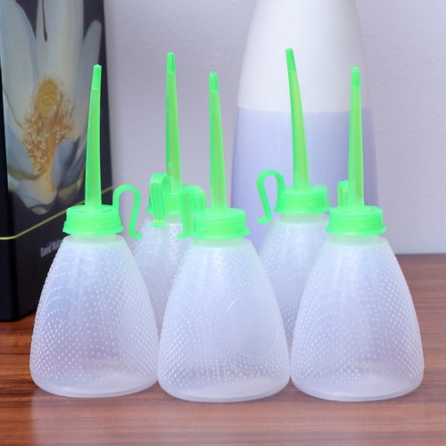 Lot bouteilles huile en - de,