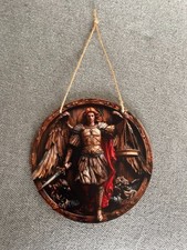 Médaille en bois peint de l'