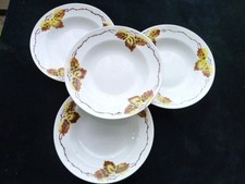 4 Assiettes creuses faïence