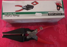 Photo Cutter : Pour la découpe de photos 35mm x 45mm. En acier. Découpe parfaite