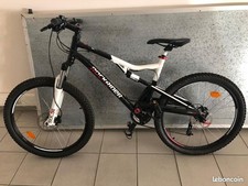 Vélo tout terrain VTT  couleur noir et blanc 28 pouce rockrider état neuf