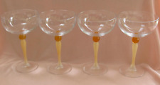 Série de 4 coupes à champagne en cristal d'Arques modèle Eden jambe rose saumon