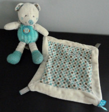 E7. DOUDOU PELUCHE NICOTOY