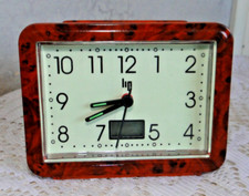 réveil LIP  à quartz marron  fonctionne vintage