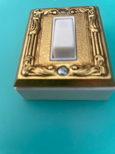 Interrupteur bronze doré